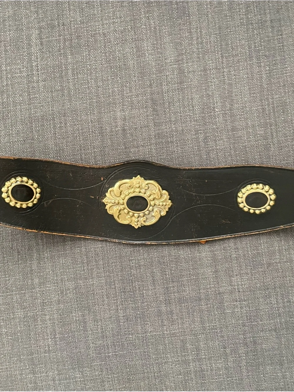 Vintage black leather with metal charms